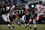 BALTIMORE - DECEMBER 20:  Ray Rice #27 of the Baltimore Ravens runs the ball against the Chicago Bears at M&T Bank Stadium on December 20, 2009 in Baltimore, Maryland. (Photo by Larry French/Getty Images)