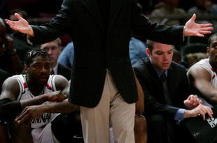 NEW YORK - MARCH 10:  Head coach Mick Cronin of the Cincinnati Bearcats gestures from the sidelines against the DePaul Blue Demons during the first round of the Big East Tournament at Madison Square Garden on March 10, 2009 in New York City.  (Photo by Michael Heiman/Getty Images)