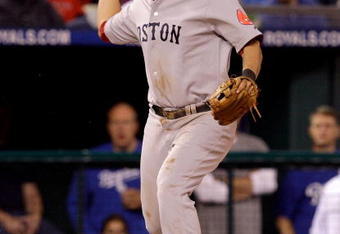 KANSAS CITY, KS - SEPTEMBER 21:  Mike Lowell #25 of the Boston Red Sox looks to throw to first base during the game against the Kansas City Royals on September 21, 2009 at Kauffman Stadium in Kansas City, Missouri. The Royals defeated the Red Sox 12-9. (Photo by Jamie Squire/Getty Images)