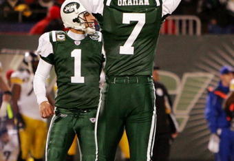 EAST RUTHERFORD, NJ - NOVEMBER 18:  Ben Graham #7 of the New York Jets celebrates teammate Mike Nugent's #1 game-winning field goal against the Pittsburgh Steelers at Giants Stadium November 18, 2007 in East Rutherford, New Jersey. The Jets defeated the Steelers 19-16 in overtime.  (Photo by Jim McIsaac/Getty Images)