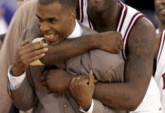 INDIANAPOLIS - DECEMBER 10:  Marco Killingsworth #5 of the Indiana Hoosiers hugs Head Coach Mike Davis after Indiana beat the Kentucky Wildcats 79-53 at the RCA Dome on December 10, 2005 in Indianapolis, Indiana.  (Photo by Andy Lyons/Getty Images)