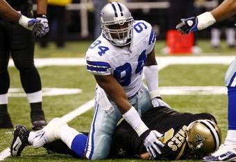 NEW ORLEANS - DECEMBER 19:  Linebacker DeMarcus Ware #94 of the Dallas Cowboys sacks quarterback Drew Brees #9 of the New Orleans Saints at the Louisiana Superdome on December 19, 2009 in New Orleans, Louisiana. (Photo by Scott Halleran/Getty Images)