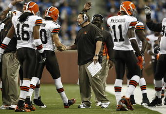 DETROIT, MI - NOVEMBER 22: Head coach Eric Mangini of the Cleveland Browns congratulates quarterback Brady Quinn #10 after a touchdown pass against the Detroit Lions at Ford Field on November 22, 2009 in Detroit, Michigan. The Lions came from behind to defeat the Browns 38-37. (Photo by Joe Robbins/Getty Images)