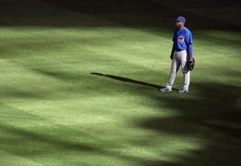 MILWAUKEE - APRIL 10: Milton Bradley #21 of the Chicago Cubs stands ready in the outfield against the Milwaukee Brewers during the Opening Day game on April 10, 2009 at Miller Park in Milwaukee, Wisconsin. (Photo by: Jonathan Daniel/Getty Images)