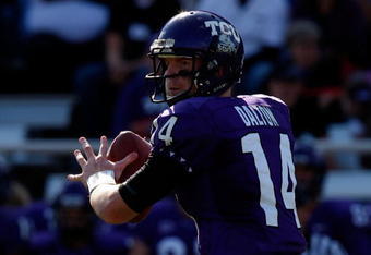 FORT WORTH, TX - NOVEMBER 28:  Quarterback Andy Dalton #14 of the TCU Horned Frogs drops back to pass against the New Mexico Lobos at Amon G. Carter Stadium on November 28, 2009 in Fort Worth, Texas.  (Photo by Ronald Martinez/Getty Images)