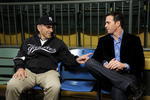 LITTLE FALLS, NJ - NOVEMBER 23:  Baseball Hall of Famer Yogi Berra and four-time Nascar champion Jimmie Johnson chat in the theater at the Yogi Berra Museum and and Learning Center on November 23, 2009 in Little Falls, New Jersey.  (Photo by Jeff Zelevansky/Getty Images for NASCAR)