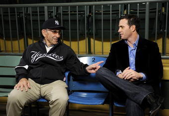 LITTLE FALLS, NJ - NOVEMBER 23:  Baseball Hall of Famer Yogi Berra and four-time Nascar champion Jimmie Johnson chat in the theater at the Yogi Berra Museum and and Learning Center on November 23, 2009 in Little Falls, New Jersey.  (Photo by Jeff Zelevansky/Getty Images for NASCAR)