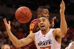 OKLAHOMA CITY - MARCH 11:  Forward Marshall Moses #33 of the Oklahoma State Cowboys grabs a rebound against Craig Brackins #21 of the Iowa State Cyclones during the Phillips 66 Big 12 Men's Basketball Championship at the Ford Center March 11, 2009 in Oklahoma City, Oklahoma.  (Photo by Ronald Martinez/Getty Images)