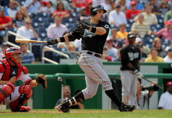 WASHINGTON - AUGUST 06:  First baseman Nick Johnson #20 of the Florida Marlins takes an at bat against the Washington Nationals at Nationals Park on August 6, 2009 in Washington, DC. The Nationals defeated the Marlins 12-8.  (Photo by Doug Pensinger/Getty Images)