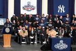 NEW YORK - NOVEMBER 06:  Captain Derek Jeter #2 (L) of the New York Yankees speaks on behalf of his team during the New York Yankees World Series Victory Celebration at City Hall on November 6, 2009 in New York, New York.  (Photo by Jim McIsaac/Getty Images)