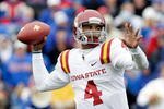 LAWRENCE, KS - OCTOBER 10:  Quarterback Austen Arnaud #4 of the Iowa State Cyclones passes during the game against the Kansas Jayhawks on October 10, 2009 at Memorial Stadium in Lawrence, Kansas.  (Photo by Jamie Squire/Getty Images)