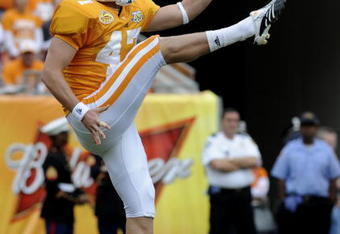 TAMPA, FL -  JANUARY 1: Punter Britton Colquitt #47 of the Tennessee Volunteers follows through on a kick against the Wisconsin Badgers in the 2008 Outback Bowl at Raymond James Stadium on January 1, 2008 in Tampa, Florida.   The Volunteers won 21 - 17. (Photo by Al Messerschmidt/Getty Images)