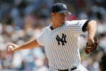 NEW YORK - JUNE 13:  Javier Vazquez #33 of the New York Yankees winds up to pitch during the interleague game against the San Diego Padres on June 13, 2004 at Yankee Stadium in the Bronx, New York. The Yankees won 6-5 in the12th inning.  (Photo by Ezra Shaw/Getty Images)