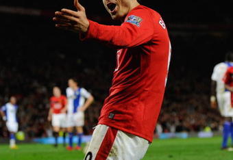 MANCHESTER, ENGLAND - OCTOBER 31:  Dimitar Berbatov of Manchester United celebrates scoring the first goal  during the Barclays Premier League match between Manchester United and Blackburn Rovers at Old Trafford on October 31, 2009 in Manchester, England.  (Photo by Michael Regan/Getty Images)