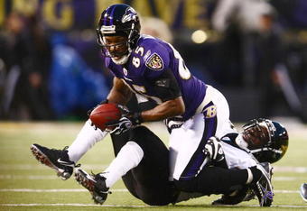 BALTIMORE - DECEMBER 28: Brian Williams #29 of the Jacksonville Jaguars tackles Derrick Mason #85 of the Baltimore Ravens during the game on December 28, 2008 at M&T Bank Stadium in Baltimore, Maryland. (Photo by Chris McGrath/Getty Images)