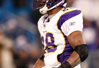 CHARLOTTE, NC - DECEMBER 20:  Adrian Peterson #28 of the Minnesota Vikings celebrates his touchdown against the Carolina Panthers at Bank of America Stadium on December 20, 2009 in Charlotte, North Carolina.  (Photo by Kevin C. Cox/Getty Images)