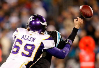 CHARLOTTE, NC - DECEMBER 20:  Jared Allen #69 of the Minnesota Vikings forces a fumble by quarterback Matt Moore #3 of the Carolina Panthers at Bank of America Stadium on December 20, 2009 in Charlotte, North Carolina.  (Photo by Kevin C. Cox/Getty Images)
