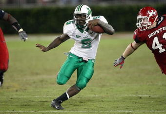 HOUSTON - NOVEMBER 17: Darius Marshall #5 of the Marshall Thundering Herd carries the ball during the game with the Houston Cougars at Robertson Stadium November 17, 2007 in Houston, Texas. Houston won 35-28. (Photo by Stephen Dunn/Getty Images)