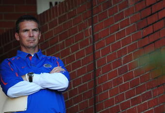 STARKVILLE, MS - OCTOBER 24:  Head coach Urban Meyer of the University of Florida Gators, during pre game warmup up against the Mississippi State Bulldogs, at Davis Wade Stadium on  October 24, 2009 in Starkville, Mississippi  (Photo by Rick Dole/Getty Images)