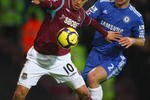 LONDON, ENGLAND - DECEMBER 20: Guillermo Franco of West Ham United is closed down by Branislav Ivanovic of Chelsea during the Barclays Premier League match between West Ham United and Chelsea at Upton Park on December 20, 2009 in London, England.  (Photo by Phil Cole/Getty Images)
