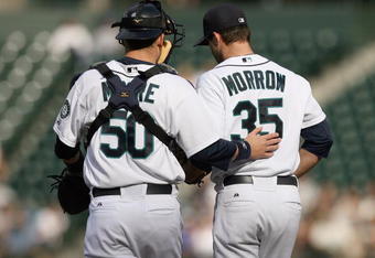 SEATTLE - SEPTEMBER 17: Pitcher Brandon Morrow #35 of the Seattle Mariners listens to catcher Adam Moore #50 during the game against the Chicago White Sox on September 17, 2009 at Safeco Field in Seattle, Washington. (Photo by Otto Greule Jr/Getty Images)