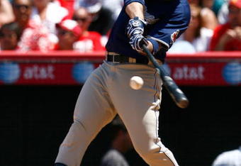 ANAHEIM, CA - JUNE 14:  Adrian Gonzalez #23 of the San Diego Padres hits a single in the sixth inning against the Los Angeles Angels of Anaheim at Angel Stadium on June 14, 2009 in Anaheim, California. The Angels defeated the Padres 6-0.  (Photo by Jeff Gross/Getty Images)