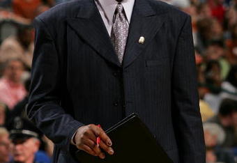 DALLAS - MARCH 12:  Assistant Coach Danny Manning of the Kansas Jayhawks looks on from the sideline during their game against the Texas Longhorns in the final of the Phillips 66 Big 12 Men's Basketball Championship Tournament at American Airlines Arena on March 12, 2006 in Dallas, Texas.  (Photo by Ronald Martinez/Getty Images)
