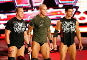 LAS VEGAS - AUGUST 24:  (L-R) Wrestlers Ted DiBiase, Randy Orton and Cody Rhodes appear during the WWE Monday Night Raw show at the Thomas & Mack Center August 24, 2009 in Las Vegas, Nevada.  (Photo by Ethan Miller/Getty Images)
