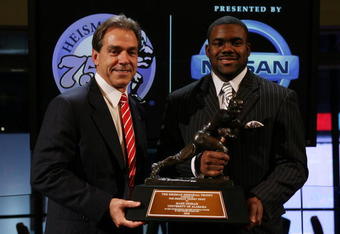 NEW YORK - DECEMBER 12: Running back Mark Ingram (R) #22 of the Alabama Crimson Tide poses with Head coach Nick Saban (L) and the Heisman Trophy during a press conference after being named the 75th Heisman Trophy winner at the Marriott Marquis on December 12, 2009 in New York City.  (Photo by Chris Trotman/Getty Images)