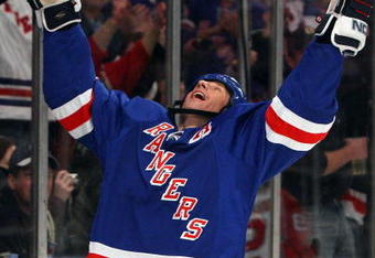 NEW YORK - DECEMBER 23:  Vinny Prospal #20 of the New York Rangers celebrates his second period goal against the Florida Panthers on  December 23, 2009 at Madison Square Garden in New York City.  (Photo by Jim McIsaac/Getty Images)