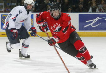 LONDON, ON, CANADA - JANUARY 4:  Taylor Hall #14 of Team Ontario cuts around Drew Shore #94 of Team USA in a game at the John Labatt Centre January 4, 2008 in London, Ontario. Team Ontario defeated Team USA 3-0 to capture the Gold Medal at the World Under 17 Challenge. (Photo by Claus Andersen/Getty Images)