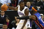 SACRAMENTO, CA - NOVEMBER 25:  Larry Hughes #0 of the New York Knicks defends against Tyreke Evans #13 of the Sacramento Kings on November 25, 2009 at ARCO Arena in Sacramento, California. NOTE TO USER: User expressly acknowledges and agrees that, by downloading and/or using this Photograph, user is consenting to the terms and conditions of the Getty Images License Agreement. (Photo by Jed Jacobsohn/Getty Images)