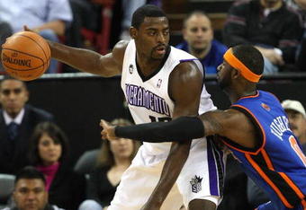 SACRAMENTO, CA - NOVEMBER 25:  Larry Hughes #0 of the New York Knicks defends against Tyreke Evans #13 of the Sacramento Kings on November 25, 2009 at ARCO Arena in Sacramento, California. NOTE TO USER: User expressly acknowledges and agrees that, by downloading and/or using this Photograph, user is consenting to the terms and conditions of the Getty Images License Agreement. (Photo by Jed Jacobsohn/Getty Images)