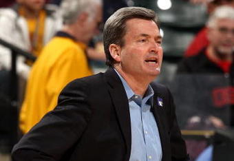 INDIANAPOLIS - MARCH 12:  Head coach Bill Carmody of the Northwestern Wildcats coaches against the Minnesota Golden Gophers during the first round of the Big Ten Men's Basketball Tournament at Conseco Fieldhouse on March 12, 2009 in Indianapolis, Indiana.  (Photo by Jonathan Daniel/Getty Images)