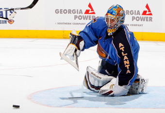 ATLANTA - DECEMBER 12:  Johan Hedberg #1 of the Atlanta Thrashers saves a shot on goal by the Montreal Canadiens at Philips Arena on December 12, 2009 in Atlanta, Georgia.  (Photo by Kevin C. Cox/Getty Images)