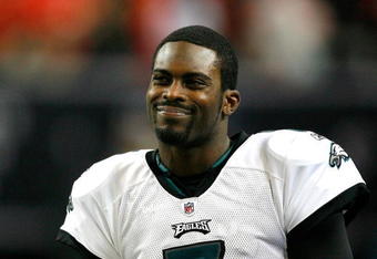 ATLANTA - DECEMBER 06:  Michael Vick #7 of the Philadelphia Eagles looks on from the sidelines during their 34-7 win over the Atlanta Falcons at Georgia Dome on December 6, 2009 in Atlanta, Georgia.  (Photo by Kevin C. Cox/Getty Images)