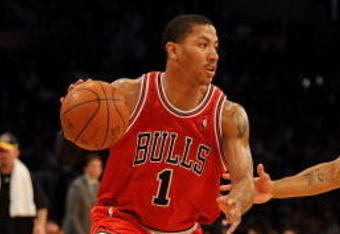 LOS ANGELES, CA - NOVEMBER 19:  Derrick Rose #1 of the Chicago Bulls drives against Derek Fisher #2 of the Los Angeles Lakers during the game on November 19, 2009 at Staples Center in Los Angeles, California.  The Lakers won 108-93.   NOTE TO USER: User expressly acknowledges and agrees that, by downloading and/or using this Photograph, User is consenting to the terms and conditions of the Getty Images License Agreement.   (Photo by Harry How/Getty Images)