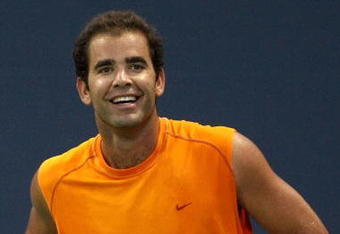 LOS ANGELES, CA - JULY 27:  Tournament honoree Pete Sampras smiles while taking on Marat Safin in the Millennium Challenge during the LA Tennis Open Day 1 at Los Angeles Tennis Center - UCLA on July 27, 2009 in Los Angeles, California.  (Photo by Stephen Dunn/Getty Images)