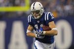INDIANAPOLIS - JANUARY 13:  Anthony Gonzalez #11 of the Indianapolis Colts runs for yards after the catch against the San Diego Chargers during their AFC Divisional Playoff game at the RCA Dome on January 13, 2008 in Indianapolis, Indiana. The Chargers won 28-24. (Photo by Streeter Lecka/Getty Images)