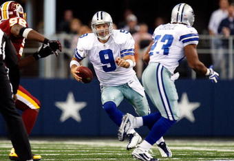 ARLINGTON, TX - NOVEMBER 22:  Quarterback Tony Romo #9 of the Dallas Cowboys runs for a first down against the Washington Redskins at Cowboys Stadium on November 22, 2009 in Arlington, Texas.  (Photo by Ronald Martinez/Getty Images)