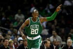 CHARLOTTE, NC - DECEMBER 01:  Ray Allen #20 of the Boston Celtics celebrates after a basket against the Charlotte Bobcats during their game at Time Warner Cable Arena on December 1, 2009 in Charlotte, North Carolina.  (Photo by Streeter Lecka/Getty Images)