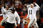 DENVER - DECEMBER 20:  Sebastian Janikowski (R) #11 of the Oakland Raiders celebrates a victory over the Denver Broncos at Invesco Field at Mile High on December 20, 2009 in Denver, Colorado. The Raiders defeated the Broncos 20-19.  (Photo by Jeff Gross/Getty Images)