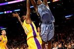 LOS ANGELES, CA - NOVEMBER 06:  Zach Randolph #50 of the Memphis Grizzlies shoots over Josh Powell #21 of the Los Angeles Lakers on November 6, 2009 at Staples Center in Los Angeles, California. The Lakers won 114-98.  NOTE TO USER: User expressly acknowledges and agrees that, by downloading and/or using this Photograph, user is consenting to the terms and conditions of the Getty Images License Agreement.  (Photo by Stephen Dunn/Getty Images)