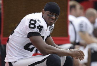 KANSAS CITY, MO - SEPTEMBER 20:  Javon Walker #84 of the Oakland Raiders looks on during the game against the Kansas City Chiefs at Arrowhead Stadium on September 20, 2009 in Kansas City, Missouri. (Photo by Jamie Squire/Getty Images)