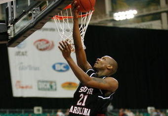 ATLANTA - MARCH 13:  Dominique Archie #21 of the South Carolina Gamecocks makes a shot against the Louisiana State University Tigers during the SEC Basketball Tournament on March 13, 2008 at the Georgia Dome in Atlanta, Georgia.  The Gamecocks defeated the Tigers 77-73.  (Photo by Chris Graythen/Getty Images)