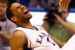 LAWRENCE, KS - DECEMBER 19:  Xavier Henry #1 of the Kansas Jayhawks reacts during the game against the Michigan Wolverines on December 19, 2009 at Allen Fieldhouse in Lawrence, Kansas.  (Photo by Jamie Squire/Getty Images)