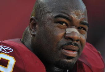 LANDOVER, MD - NOVEMBER 15:  Albert Haynesworth #92 of the Washington Redskins sits on the sidelines during the game against the Denver Broncos at FedExField on November 15, 2009 in Landover, Maryland. The Redskins defeated the Broncos 27-17. (Photo by Larry French/Getty Images)