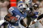 25 Oct 1998: Barry Sanders #20 of the Detroit Lions grips the ball as he runs during the game against the Minnesota Vikings at the Pontiac Silverdome in Pontiac Michigan. The Vikings defeated the Lions 34-13. Mandatory Credit: Tom Pidgeon  /Allsport