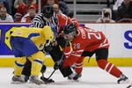 OTTAWA, ON - JANUARY 5:  Marcus Johansson #11 of Team Sweden takes the faceoff against Patrice Cormier #28 of Team Canada at the Gold Medal Game of the IIHF World Junior Championships at Scotiabank Place on January 05, 2009 in Ottawa, Ontario, Canada.  Team Canada defeated Team Sweden 5-1.  (Photo by Richard Wolowicz/Getty Images)