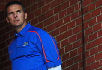 STARKVILLE, MS - OCTOBER 24:  Head coach Urban Meyer of the University of Florida Gators, during pre game warmup up against the Mississippi State Bulldogs, at Davis Wade Stadium on  October 24, 2009 in Starkville, Mississippi  (Photo by Rick Dole/Getty Images)